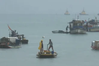 Pescadores no mar